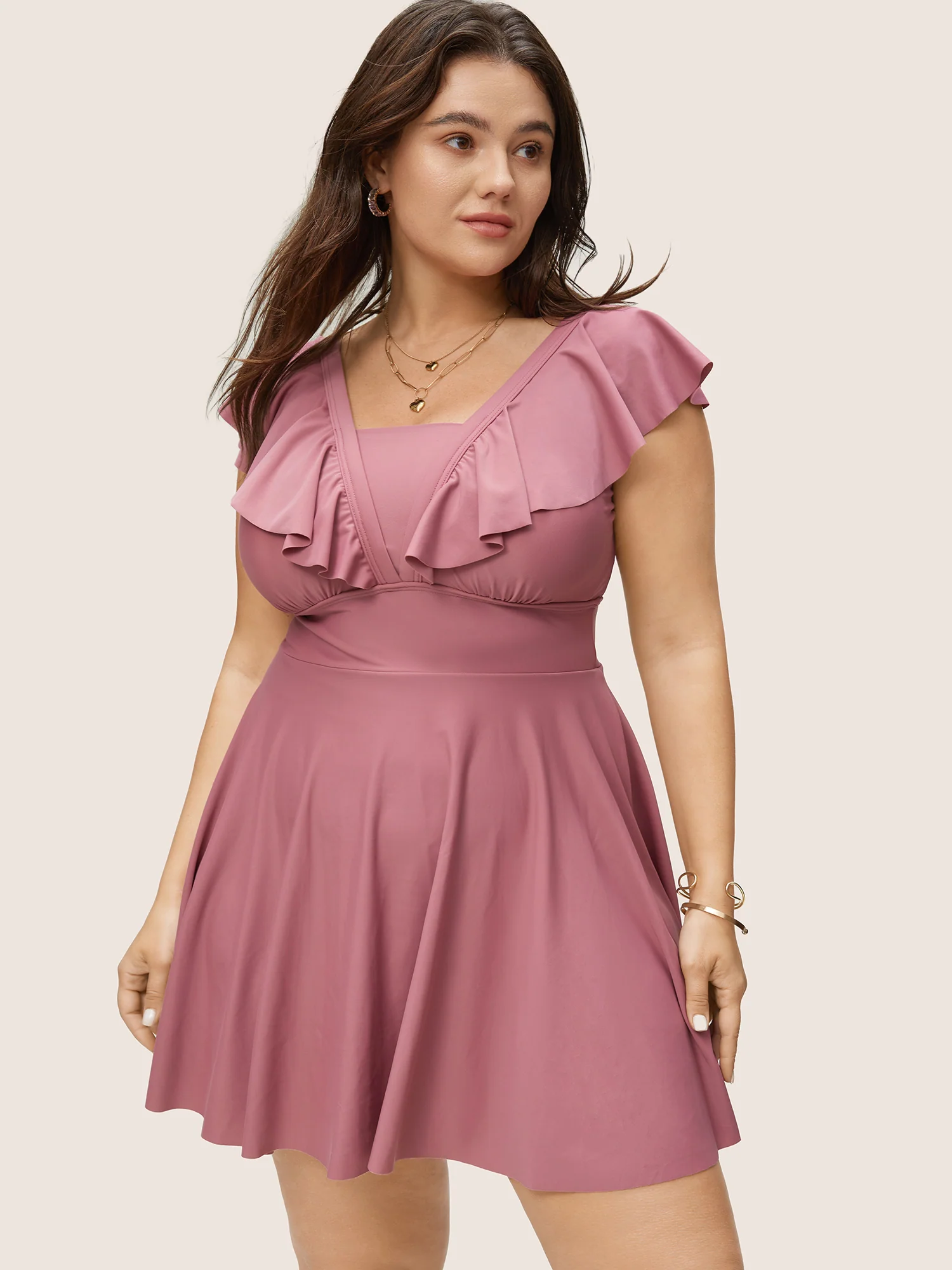 BloomChic solid A-line swim dress with flutter trim