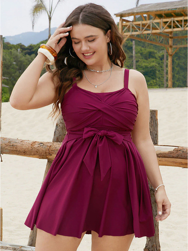 BloomChic bowknot swim dress with adjustable straps and a sweetheart neckline
