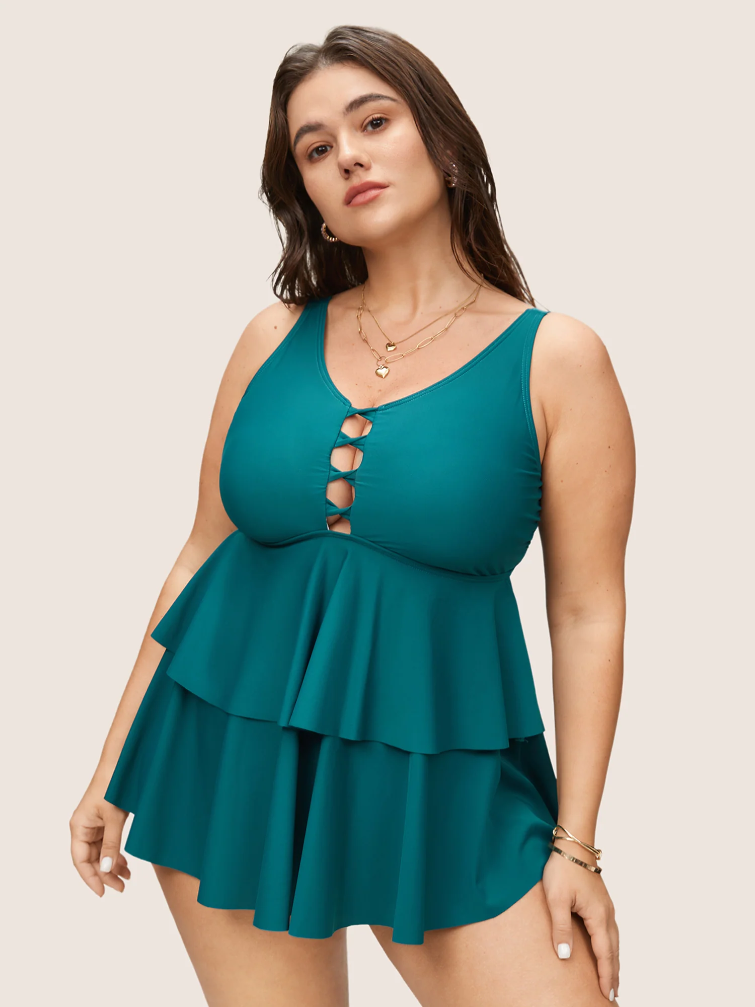 BloomChic solid keyhole swim top with a tiered ruffle hem