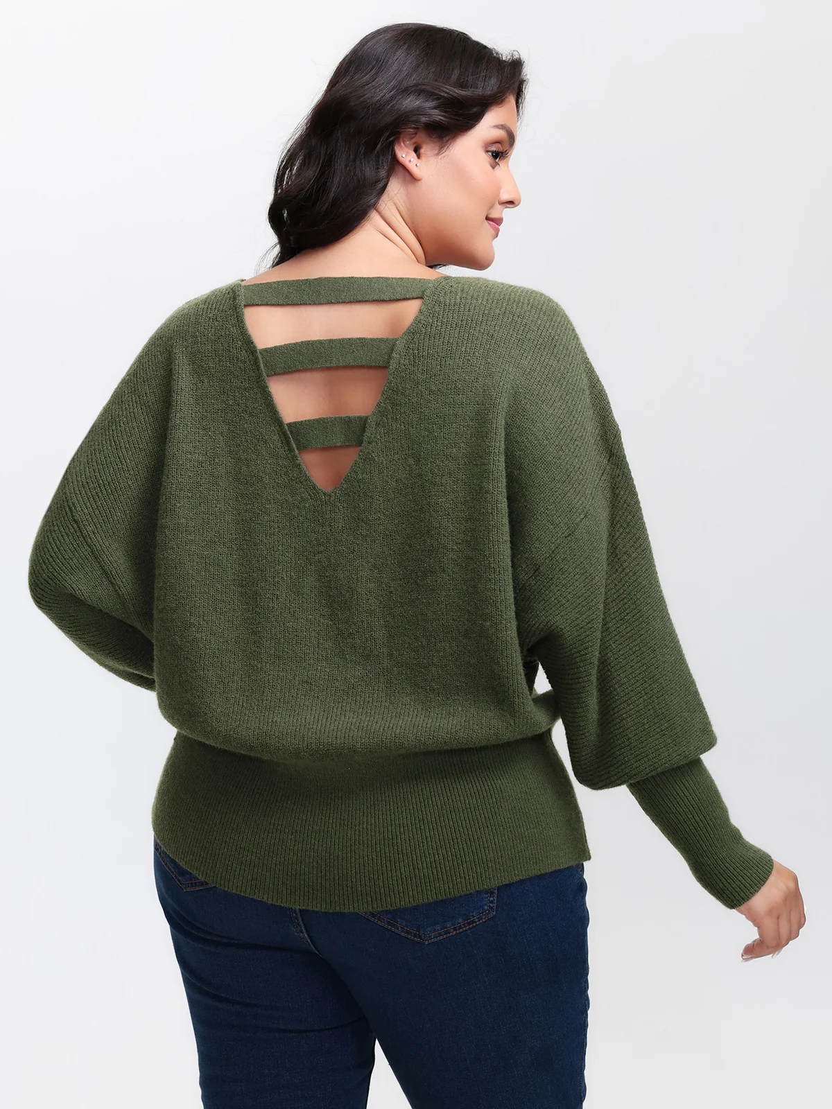 BloomChic cropped pullover with an open-back cutout