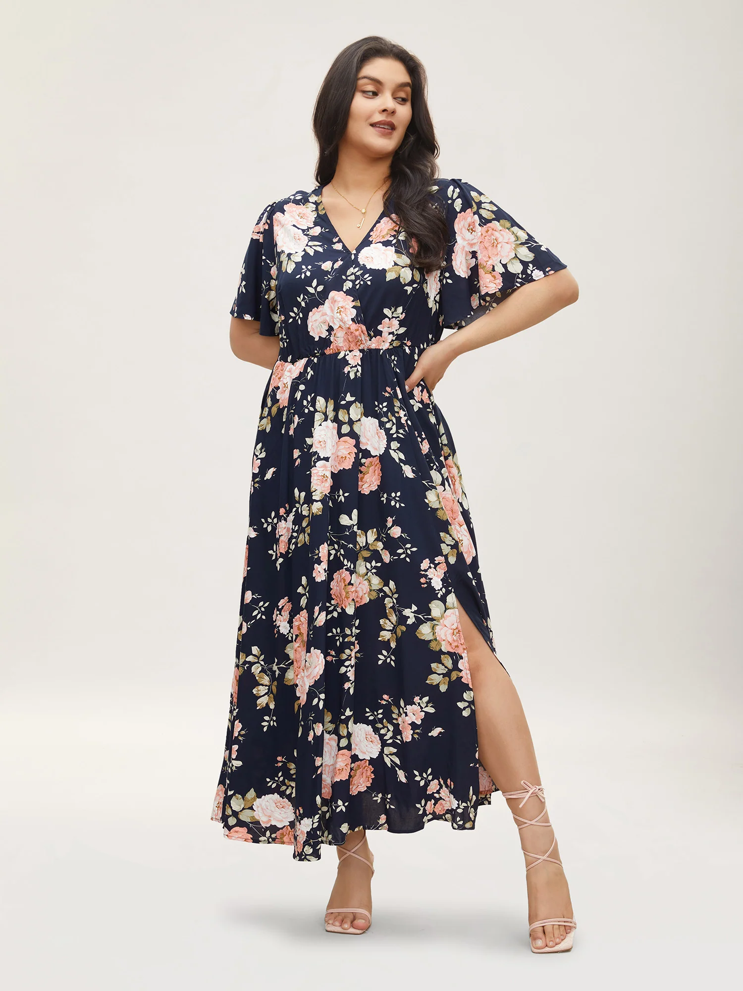 BloomChic Bloom Dress with flutter sleeves, floral print, pocket and split maxi hem