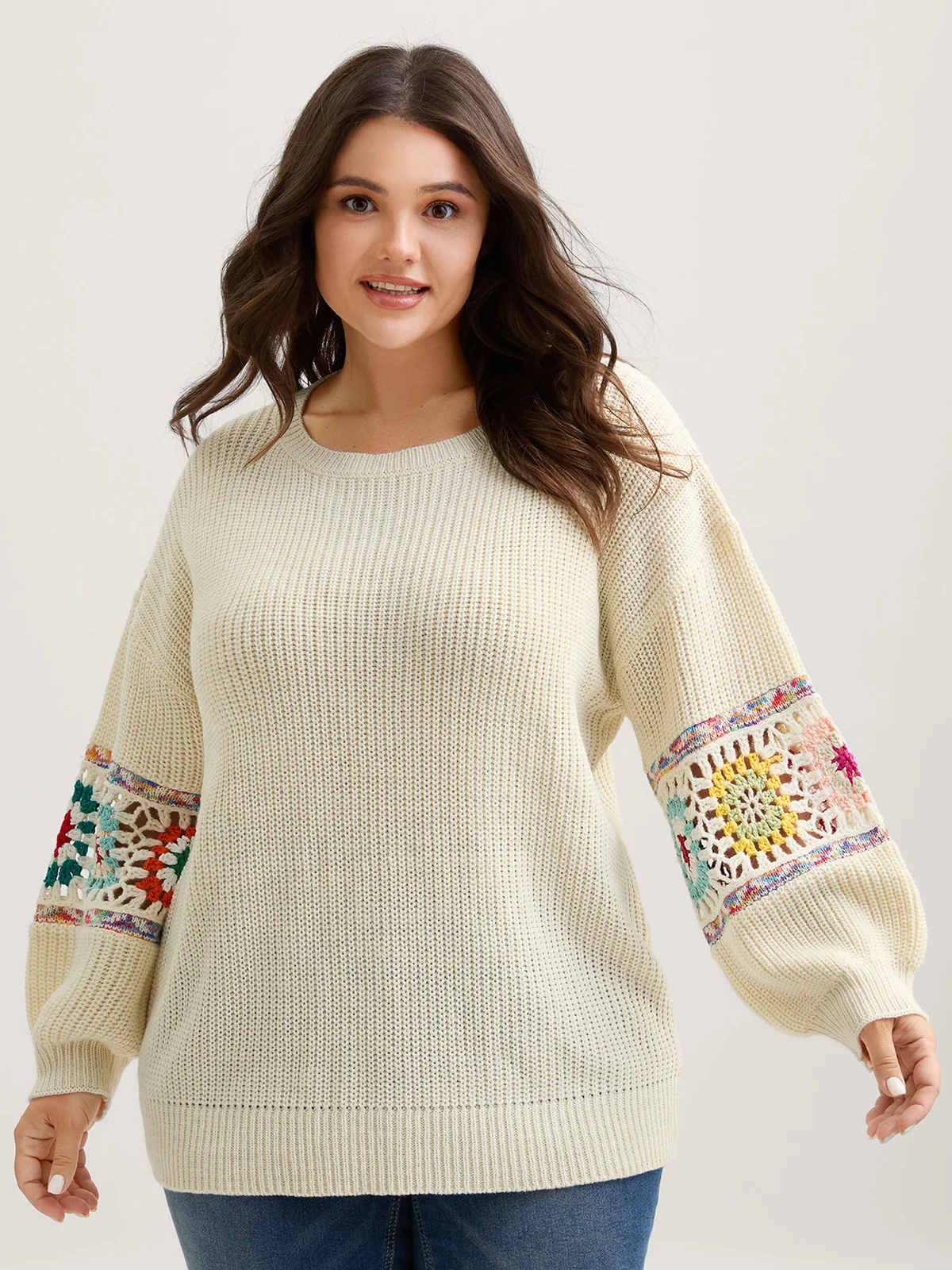 BloomChic pullover with crochet floral sleeves and lace trim