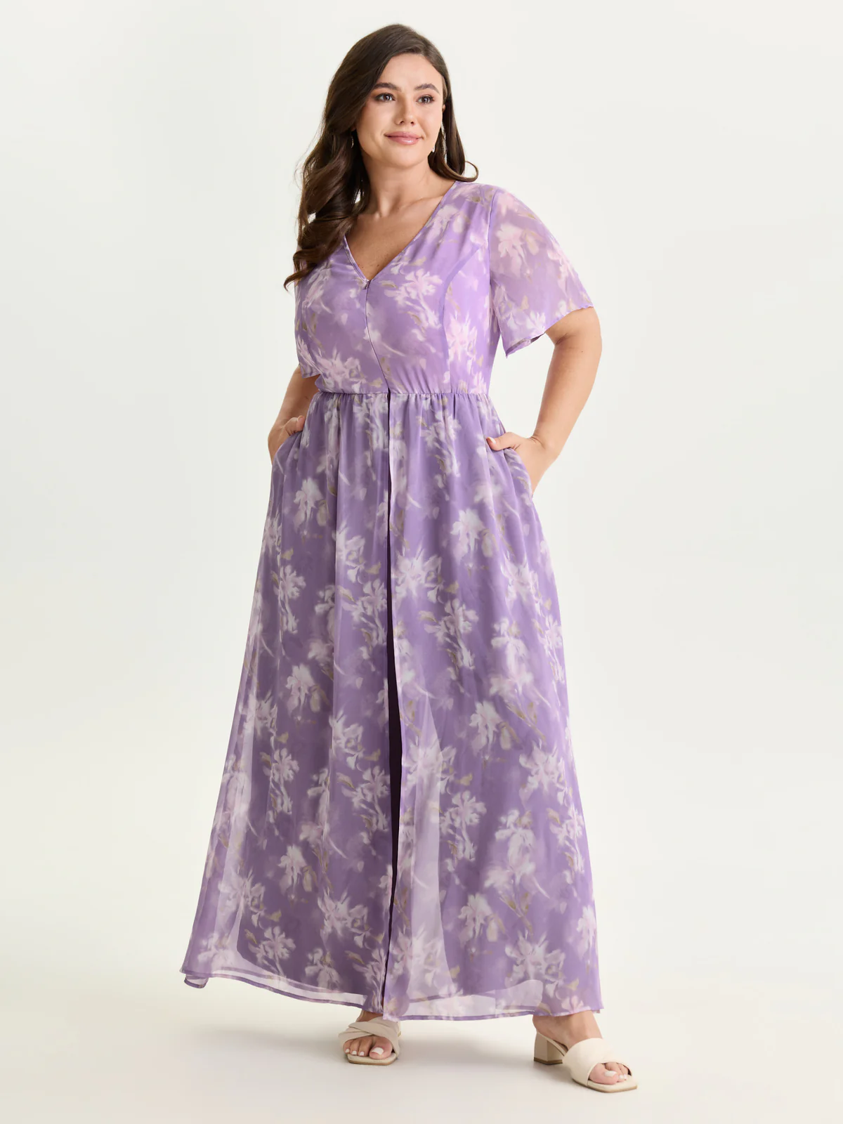 BloomChic floral layered jumpsuit with a hidden zipper and pockets