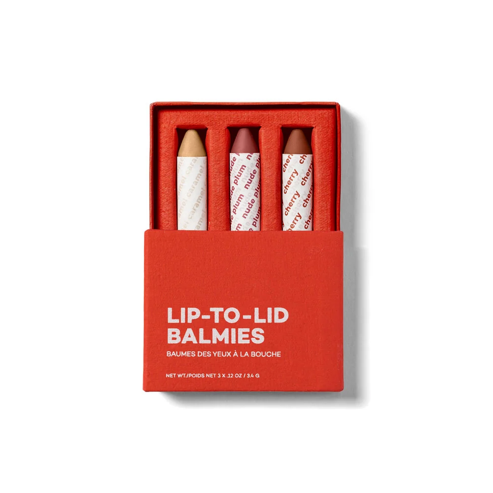 Three Axiology Balmie crayons in a red presentation box.