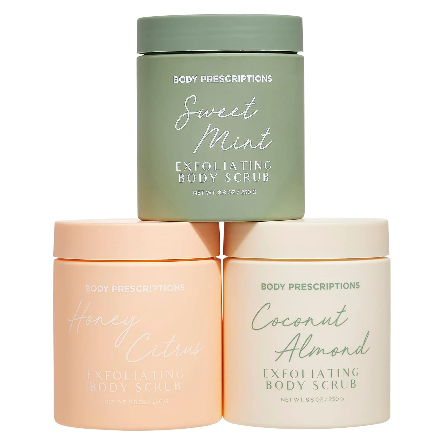 Body Prescriptions scrub jars labeled Sweet Mint, Honey Citrus and Coconut Almond.