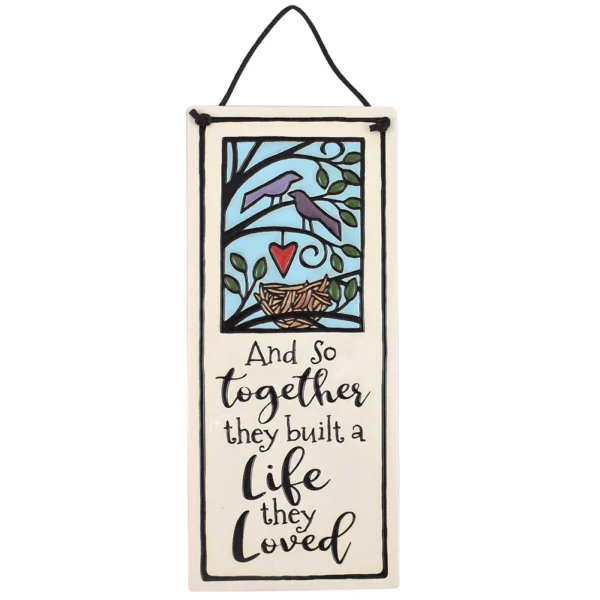 Ceramic plaque reading Together They Built a Life.