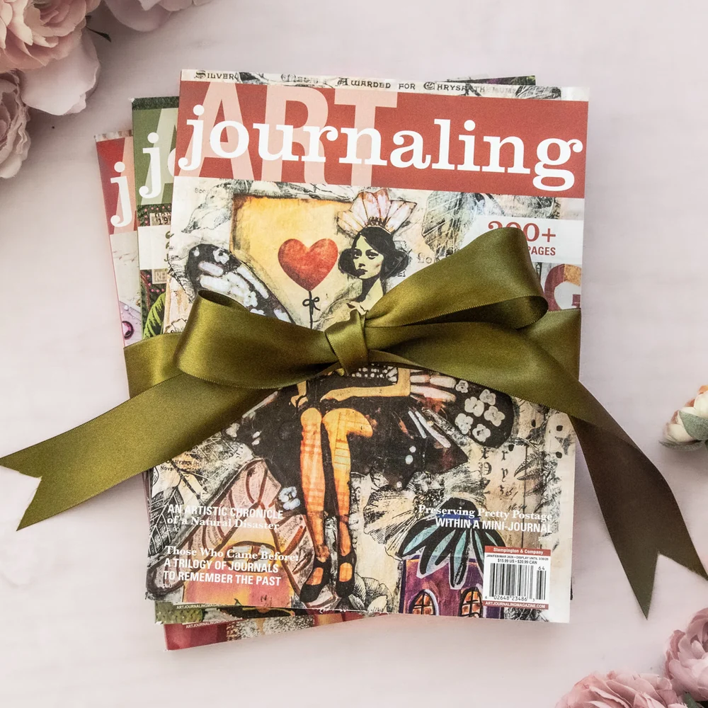 Art Journaling magazine bundle tied with an olive-colored ribbon.