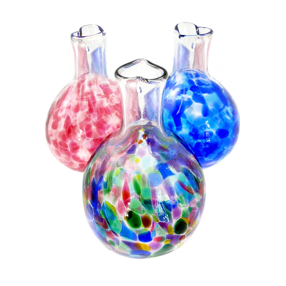 Heart-stemmed glass bud vase shown in pink, cobalt blue and rainbow color options.