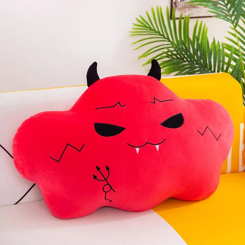 77 Best Christmas Gift Ideas That Feel Personal, Useful and Fun 66 Red cloud-shaped plush pillow with black horns and a mischievous face.