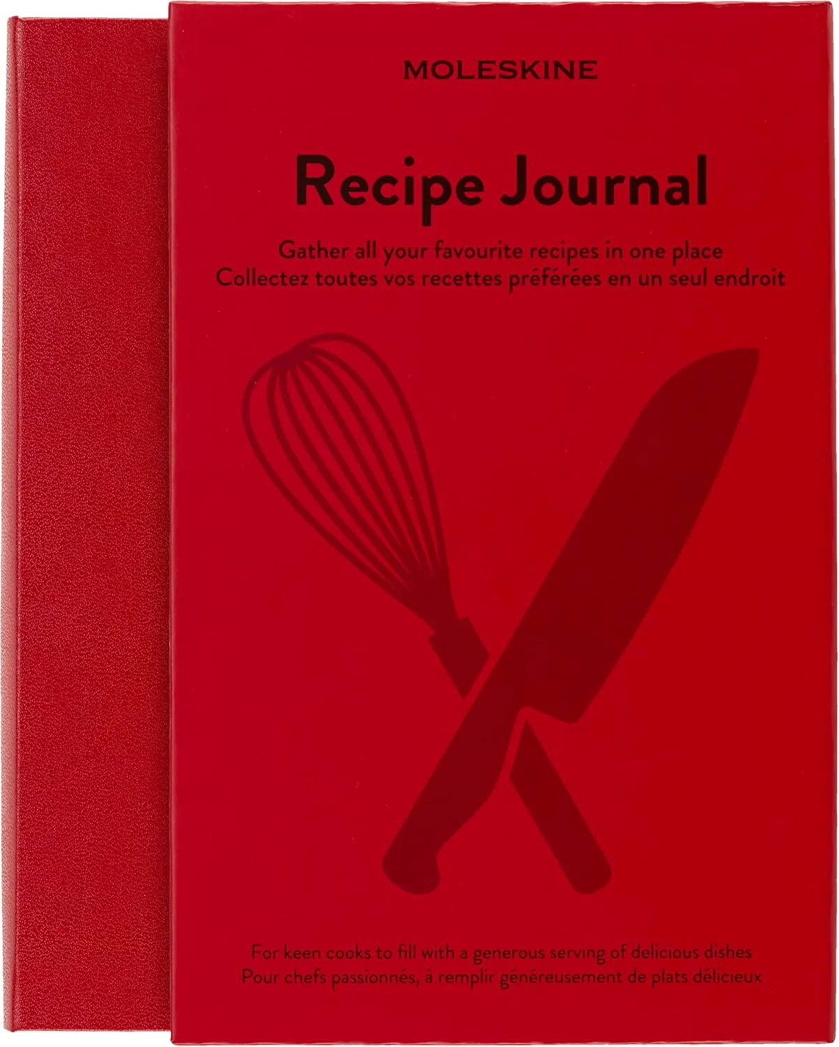 Scarlet red Moleskine Recipe Journal with kitchen-tool illustrations.